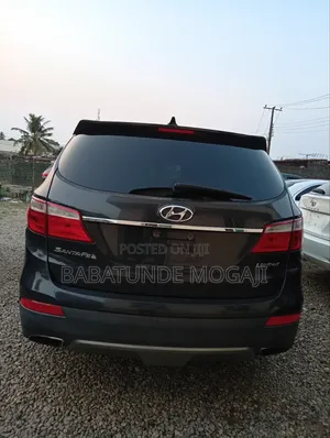 Hyundai Santa Fe Limited 4dr SUV AWD w/Saddle Interior (3.3L 6cyl 6A)