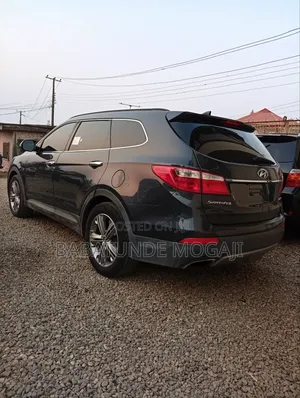 Hyundai Santa Fe Limited 4dr SUV AWD w/Saddle Interior (3.3L 6cyl 6A)