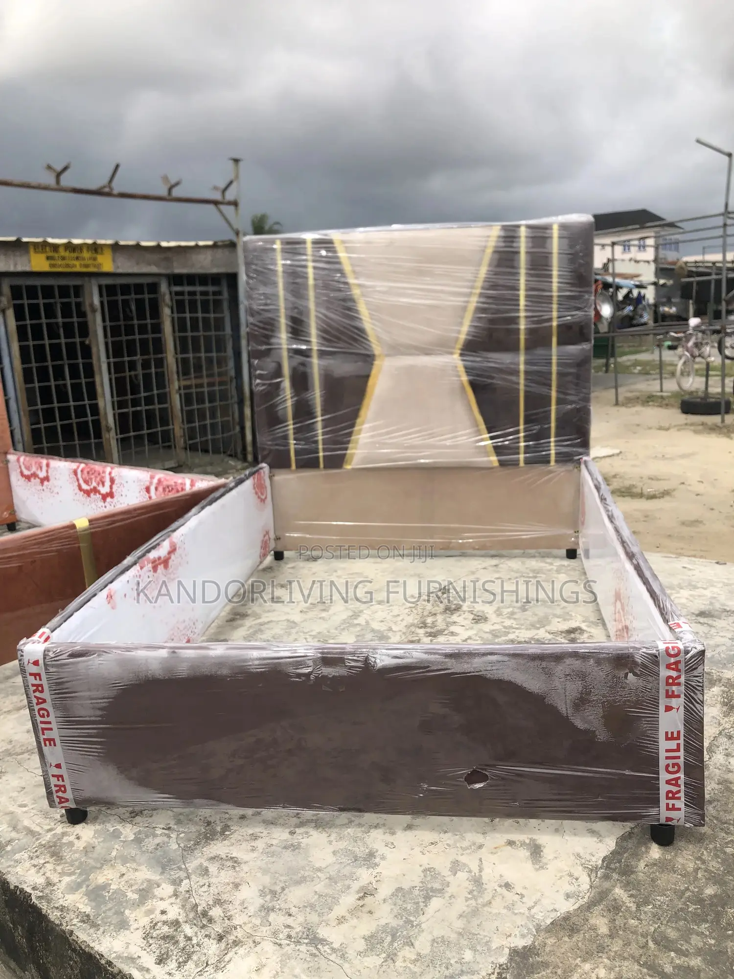 4.5 by 6 Padded Bed Frame With Gold Strips