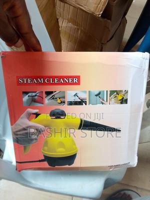 1000w Handheld Steam Cleaner Used for Versatile Cleaning Tasks.
