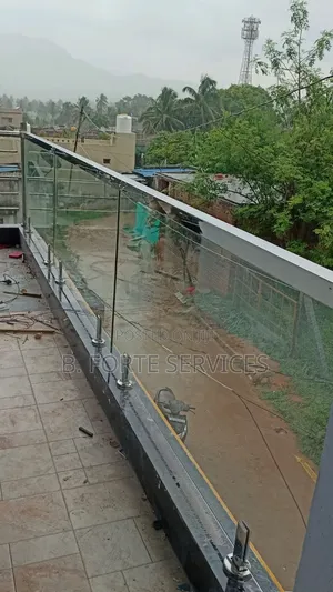 Glass Balcony Railing With Stainless Steel Finish