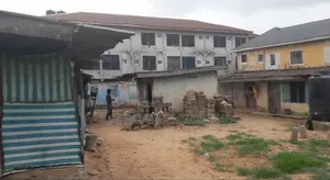 This Is One And Half Plot At Mbari Street Along Diamond Acceess Bank .