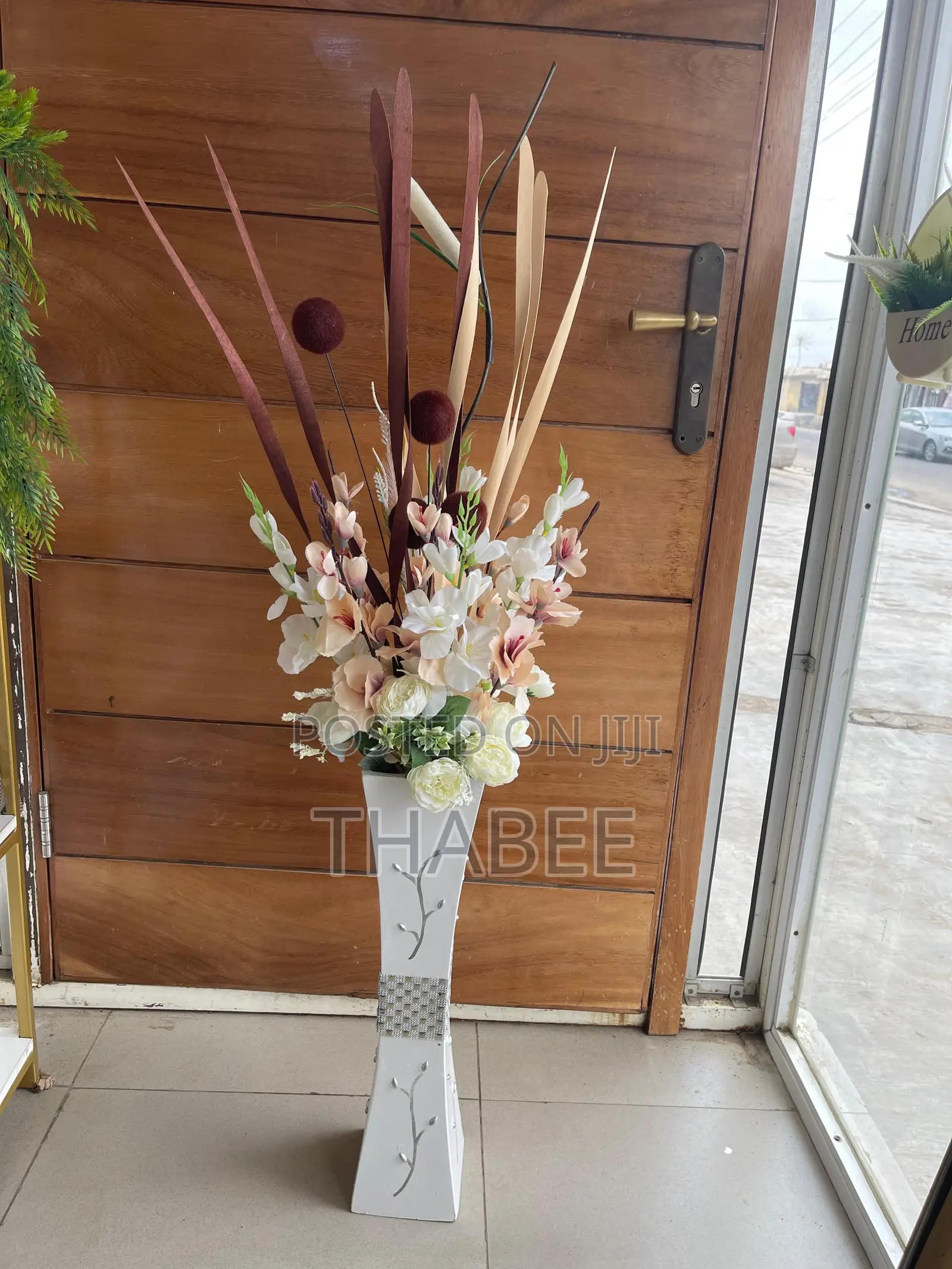 Sunflower in White Grooved Plastic Vase