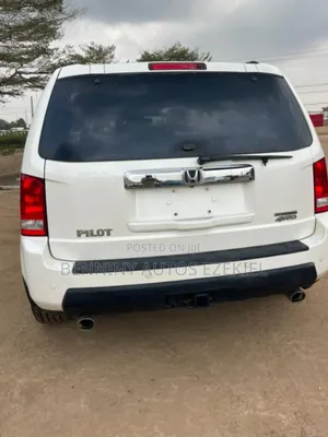 Honda Pilot Touring w/RES/Navi 4WD (3.5L 6cyl 5A) 2013 White