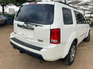 Honda Pilot Touring w/RES/Navi 4WD (3.5L 6cyl 5A) 2013 White