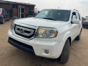 Honda Pilot Touring w/RES/Navi 4WD (3.5L 6cyl 5A) 2013 White