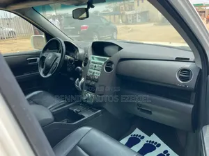 Honda Pilot Touring w/RES/Navi 4WD (3.5L 6cyl 5A) 2013 White