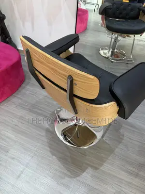 Trendy Saloon Chair With Wooden Design