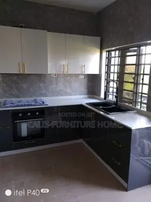 L-Shape Kitchen Cabinets. White and Grey Color