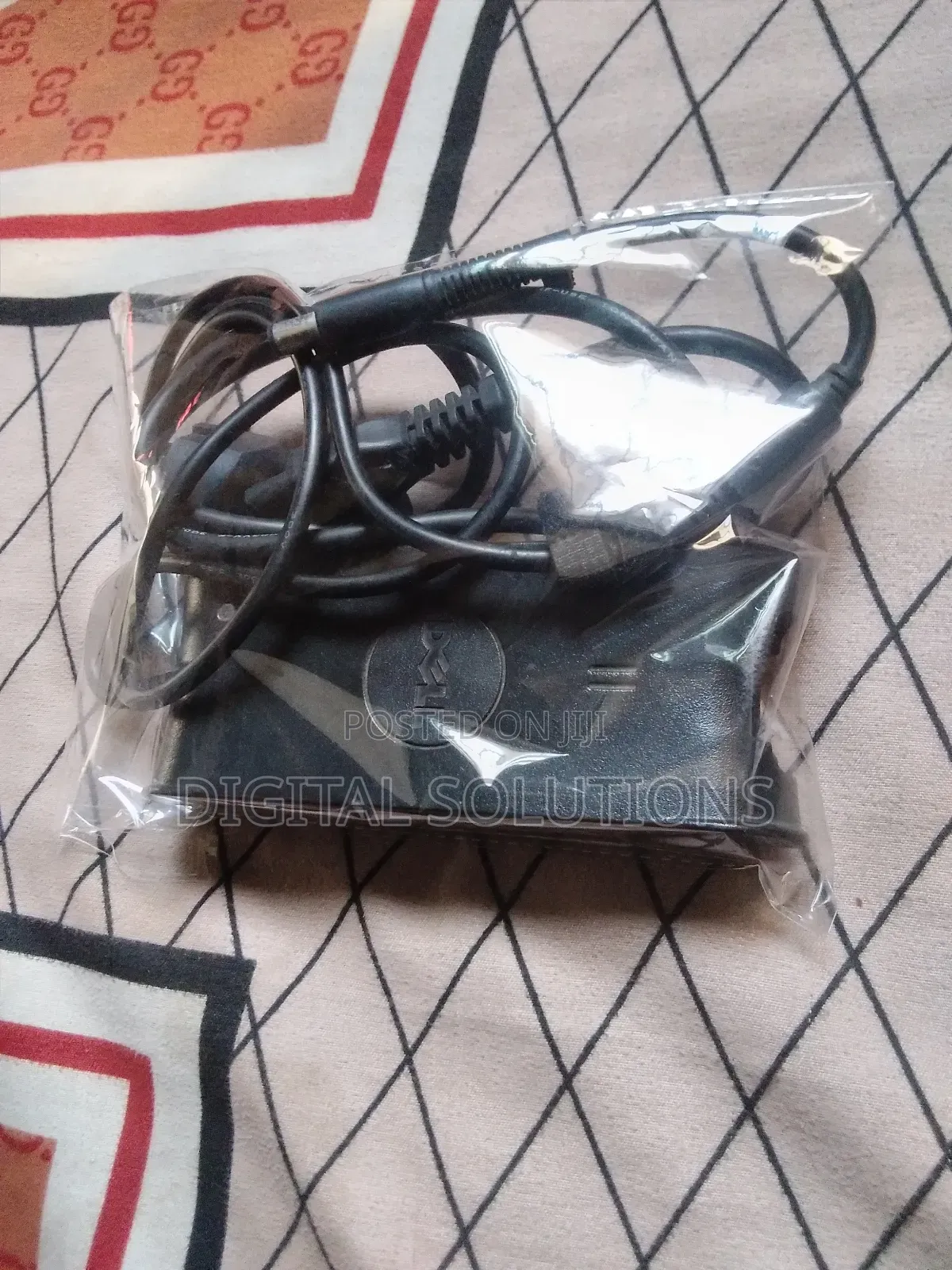 Dell Original Follow-Come Laptop Charger.