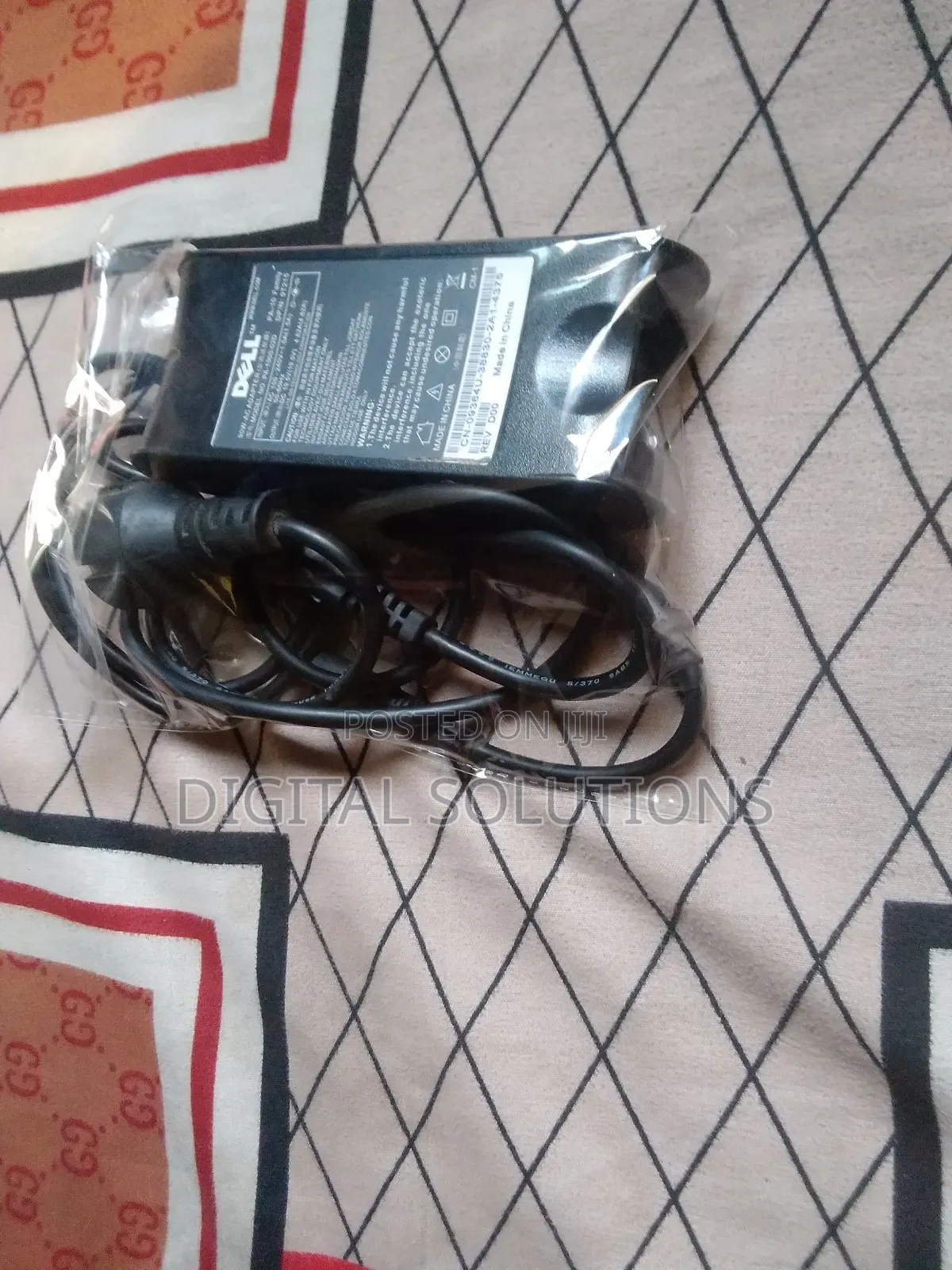 Dell Original Follow-Come Laptop Charger.