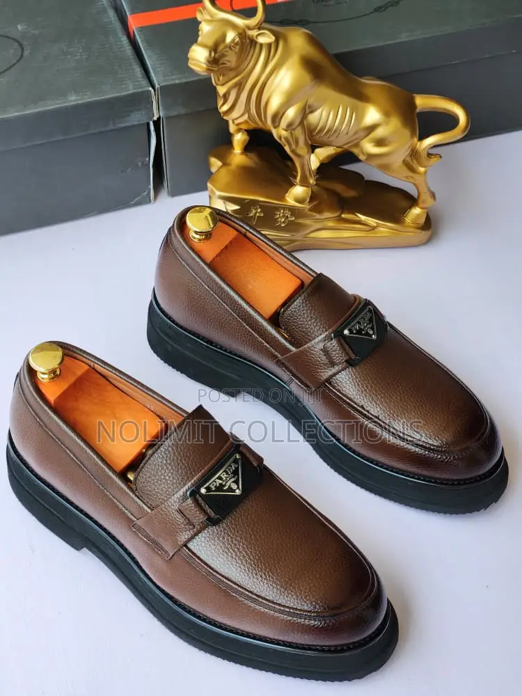 Prada Grained Leather Loafers