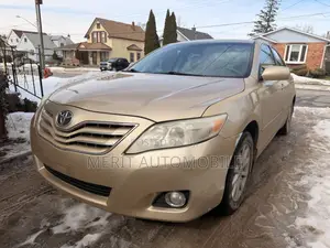 Toyota Camry XLE V6 4dr Sedan (3.5L 6cyl 6AM) 2010 Gold