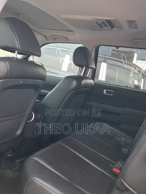 Honda Pilot Touring w/RES/Navi 4WD (3.5L 6cyl 5A) 2013 Burgundy