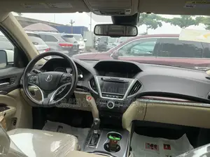 Acura MDX SUV 4dr FWD (3.5L 6cyl 9A) 2016 Gold