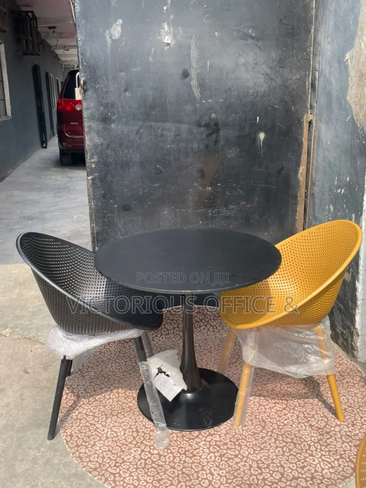 Modern Tulip Table 2 Perforated Chairs