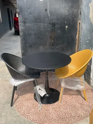 Modern Tulip Table 2 Perforated Chairs