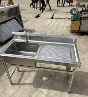 This Is Stainless Steel Double Bowl Sink With a Side