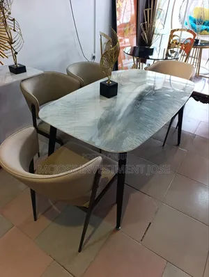 Exotic Dining Table Set by 6 Chairs.