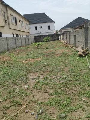 Standard Half Plot of Land Fence Gated in an Estate in Ayobo