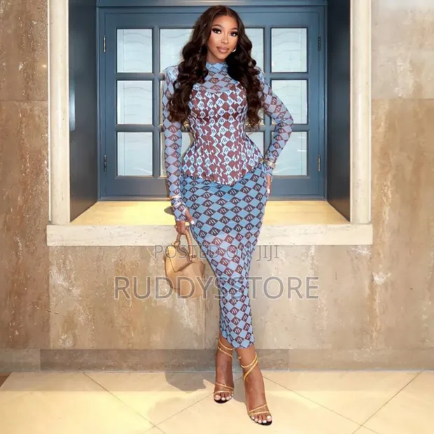 Elegant Shoulder-Padded Mesh Dress  Stylish Outfit for Women for sale -  Ruddysstore  Price:  56,000 on Jiji.ng [Ikoyi]