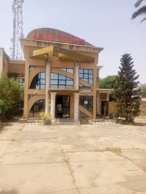 Commercial Property on 31⁄4 Plots of Land