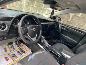 Toyota Corolla LE (1.8L 4cyl 2A) 2018 Brown