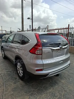 Honda CR-V EX-L w/Navigation 4dr SUV AWD (2.4L 4cyl CVT) 2015 Silver