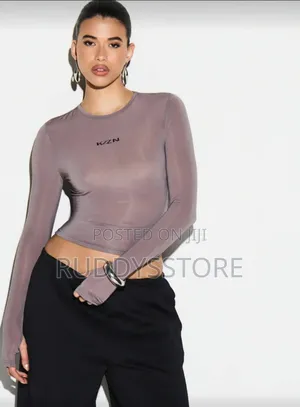 Kizn Mesh Thumb Hole Sleeve Top – Stylish Women’S Wear
