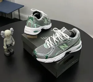 Ash/Green New Balance 740 Sneakers