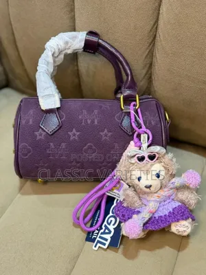 Miss Gail Purple Bowler Bag.