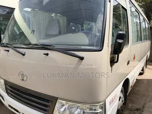 Toyota Coaster 2019 Gold