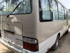 Toyota Coaster 2019 Gold