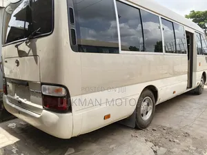 Toyota Coaster 2018 Gold
