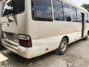 Toyota Coaster 2018 Gold