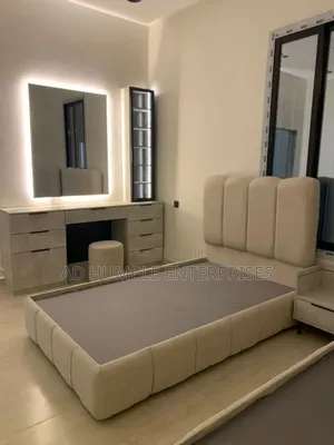 Elevate Your Space With This Sleek Bedframe With Dressing Mirror