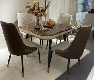 Luxury Modern 4-Seater Dining Set With Gold Accents.