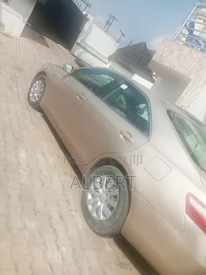 Toyota Camry LE V6 4dr Sedan (3.5L 6cyl 6AM) 2009 Gold
