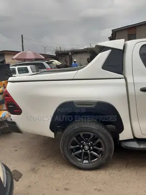 Automatic Roller Boot Cover and TRD Spoiler Hilux Revo