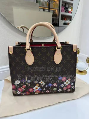 Louis Vuitton Floral Designer Handbag
