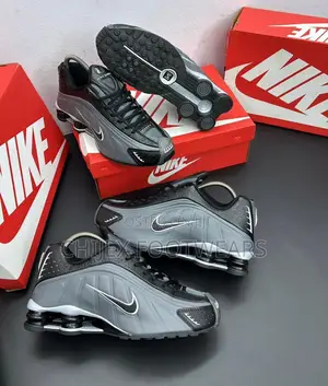 Nike Shox R4 in Metallic Silver and Black.