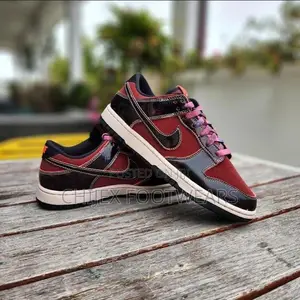 Nike Dunk Low Retro Se 'Panda-Monium - Dark Team Red'.