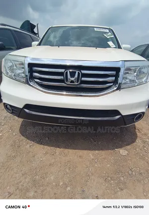 Honda Pilot Touring w/RES/Navi 4WD (3.5L 6cyl 5A) 2013 White