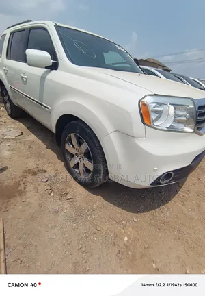 Honda Pilot Touring w/RES/Navi 4WD (3.5L 6cyl 5A) 2013 White