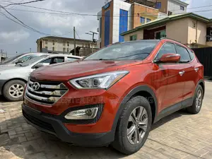 Hyundai Santa Fe GLS 4dr SUV AWD (3.3L 6cyl 6A) 2015 Orange