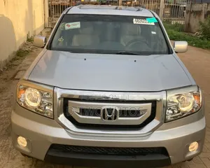 Honda Pilot Touring w/RES/Navi FWD (3.5L 6cyl 5A) 2011 Silver