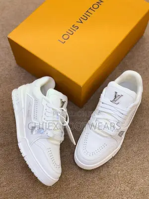 Louis Vuitton Lv Trainer Sneakers in a White Colorway.