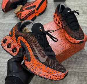 Nike Air Max Dn "Safari" Sneakers Featuring a Vibrant Orange