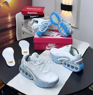 Nike Air Max Dn Sneaker, Specifically in a Blue-Accented Colorway
