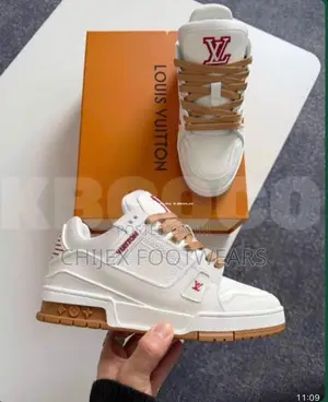 Louis Vuitton Lv Trainer Sneakers in a White and Red Colorway.